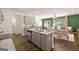 Open-concept kitchen with stainless appliances and granite countertops at 1402 Grand Branch Dr, Lawrenceville, GA 30045