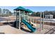 Community playground area with slides and climbing equipment at 1402 Grand Branch Dr, Lawrenceville, GA 30045