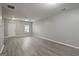 Spacious living room with gray floors and ceiling fan at 2137 Chadwick Sw Rd, Atlanta, GA 30331