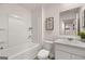 Bathroom featuring a shower, a toilet, a vanity and a sink at 1404 Gray Branch Dr, Lawrenceville, GA 30045