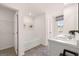 Bright bathroom features double sinks, marble countertops, and a separate tub at 1404 Gray Branch Dr, Lawrenceville, GA 30045