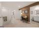 Upstairs hallway landing featuring a desk area and access to a bathroom and bedrooms at 1404 Gray Branch Dr, Lawrenceville, GA 30045