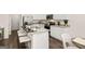 Elegant kitchen island with seating and stainless appliances provides ample space and storage at 1404 Gray Branch Dr, Lawrenceville, GA 30045