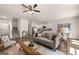An open concept floorplan with sight lines from the living room to the kitchen and staircase at 1404 Gray Branch Dr, Lawrenceville, GA 30045