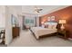 This primary bedroom offers a serene retreat with a king bed and ample natural light at 1404 Gray Branch Dr, Lawrenceville, GA 30045