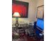 Office space shows a modern black desk, colorful artwork, and organized workspace, ideal for productivity at 3745 Meeting St, Duluth, GA 30096