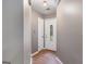 Entryway with wood-look floors and a decorative glass front door at 113 Caldwell Dr, Hampton, GA 30228