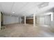 Unfinished basement with bar and several support columns at 1460 Bakers Bridge Rd, Douglasville, GA 30134