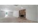 Unfinished basement space with a stone fireplace feature at 1460 Bakers Bridge Rd, Douglasville, GA 30134
