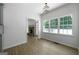 Eat in kitchen dining with lots of light and hardwood floors at 1460 Bakers Bridge Rd, Douglasville, GA 30134