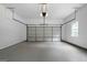 Spacious two car garage with an automatic door and plenty of room for parking and storage at 1460 Bakers Bridge Rd, Douglasville, GA 30134