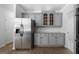 Stylish kitchen featuring stainless steel appliances, granite countertops, and subway tile backsplash at 1460 Bakers Bridge Rd, Douglasville, GA 30134