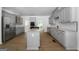 A well designed kitchen with stainless steel appliances and an island cooktop at 1460 Bakers Bridge Rd, Douglasville, GA 30134