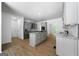 Modern kitchen featuring stainless steel appliances and a center island with granite countertops at 1460 Bakers Bridge Rd, Douglasville, GA 30134