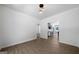 Inviting living room with wood-look floors and views into the kitchen, perfect for entertaining at 1460 Bakers Bridge Rd, Douglasville, GA 30134