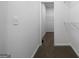 Convenient walk-in closet with built-in shelving, providing ample storage solutions at 1460 Bakers Bridge Rd, Douglasville, GA 30134