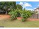 Picturesque backyard featuring lush trees, mulch beds, and well-maintained landscaping at 1602 Cascade Overlook, Peachtree City, GA 30269