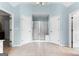 Bathroom showing a shower, access to other bathrooms, and tile flooring at 1602 Cascade Overlook, Peachtree City, GA 30269