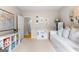 Bedroom featuring a bed, decorations, ample natural light, and neutral colored walls at 1602 Cascade Overlook, Peachtree City, GA 30269