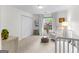 Bright bedroom with a white crib, chair, storage, and a window for ample natural light at 1602 Cascade Overlook, Peachtree City, GA 30269