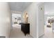 Hallway with a cabinet and mirror leading to a bedroom and another room at 1602 Cascade Overlook, Peachtree City, GA 30269