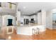 Open kitchen featuring a breakfast bar with seating and view of the entry at 1602 Cascade Overlook, Peachtree City, GA 30269