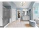 Main bathroom showcasing a glass door shower, vanity, and tub at 1602 Cascade Overlook, Peachtree City, GA 30269