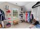 Well-organized walk-in closet with shelves and clothing racks at 1602 Cascade Overlook, Peachtree City, GA 30269