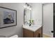 Modern bathroom featuring a stylish mirror, sleek vanity, and contemporary fixtures at 1239 Teakwood Trl, Stone Mountain, GA 30083