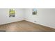 Bedroom with wood-look floors and double-paned window that lets in lots of light at 1239 Teakwood Trl, Stone Mountain, GA 30083