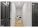 Hallway view, connecting various areas of the home and leading to other living spaces at 1239 Teakwood Trl, Stone Mountain, GA 30083