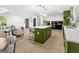 Open concept kitchen with a central island, ideal for entertaining and casual dining at 1239 Teakwood Trl, Stone Mountain, GA 30083