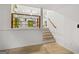 View of living area with stairs and railing; provides open concept and airy ambiance at 1239 Teakwood Trl, Stone Mountain, GA 30083