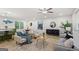 Cozy living area featuring modern furniture, hardwood flooring, and natural light at 1239 Teakwood Trl, Stone Mountain, GA 30083