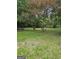 The backyard has mature trees, providing shade and privacy for outdoor enjoyment at 2670 Foxlair Trl, South Fulton, GA 30349