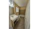 Cozy full bathroom with neutral tile, a vanity and shower-tub combo for a comfortable experience at 2670 Foxlair Trl, South Fulton, GA 30349