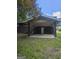This home has a stylish carport featuring decorative iron posts offering parking and protection from the elements at 2670 Foxlair Trl, South Fulton, GA 30349