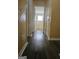 Hallway with wood floors leading to a bedroom at 2670 Foxlair Trl, South Fulton, GA 30349