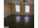Spacious living room features hardwood floors, neutral walls and great natural light at 2670 Foxlair Trl, South Fulton, GA 30349