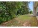 Spacious backyard surrounded by lush greenery and trees, providing a serene and private outdoor space at 2928 Mandy Ct, Jonesboro, GA 30236