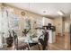 Cozy dining area with chandelier, hardwood floors and natural lighting at 2928 Mandy Ct, Jonesboro, GA 30236