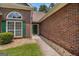 Close-up of the brick facade and green front door of the house at 2928 Mandy Ct, Jonesboro, GA 30236