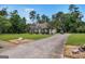 Long driveway and home with brick exterior at 2928 Mandy Ct, Jonesboro, GA 30236