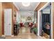 Hallway leading into the living room featuring hardwood floors and neutral tones at 2928 Mandy Ct, Jonesboro, GA 30236