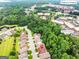 Aerial view of a neighborhood near Piedmont Hospital and Togwotee shopping center in a wooded location at 370 Grand Teton Cir, Fayetteville, GA 30215