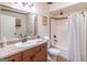 Clean bathroom featuring neutral counters, modern sink, and shower-tub combo with neutral tile at 370 Grand Teton Cir, Fayetteville, GA 30215