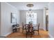 Elegant dining room with a chandelier, wood floors, and traditional decor at 370 Grand Teton Cir, Fayetteville, GA 30215