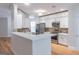 Updated kitchen featuring white cabinets, stainless steel appliances and an open layout at 370 Grand Teton Cir, Fayetteville, GA 30215