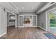 Finished basement featuring an entertainment area and French doors to the outside at 55 Jolie Ln, Sharpsburg, GA 30277