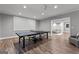 Game room featuring a ping pong table and adjacent living area at 55 Jolie Ln, Sharpsburg, GA 30277